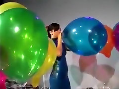 Sexy Girl In Latex great slave ffm Blows to Pop Some Big Balloons