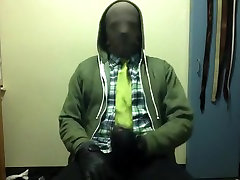 Jerk-off in hood, jacket, gloves, tie, tights and boots two