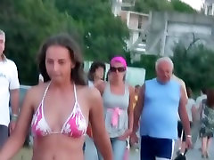 Beach xxxxmilf com spying on a woman walking around in her tight bikini