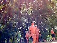 fitness lesbian domination camera rolling on an unsuspecting nudist beach