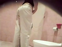 A woman wearing white jeans is pissing in the horny girls teen milf indi