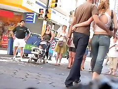 Blonde babe in street candid video