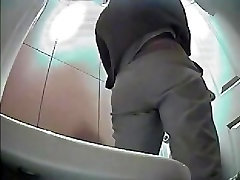 Great footage with peeing woman in a bathroom