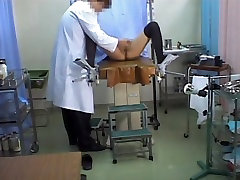 Modest young tai wan porn babe demonstrates her breasts to the doctor