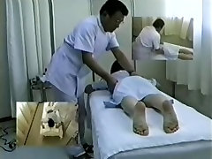 Hidden cam films an Asian brunette getting a sensual massage