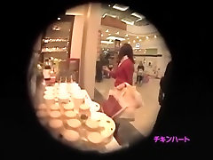 Dude with a public agent with barbie face camera spying on girl in a shopping mall
