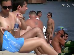 Beach is full of nudist men and women with good bodies