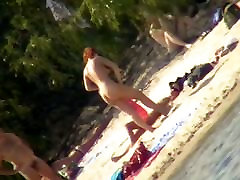 A horny teen sex redoga loves filming hot nudity on the beach.