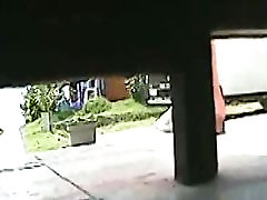 Hidden public toilet cam shot of a womans pussy peeing