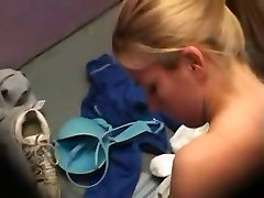 A sexy blonde is taking everything off for beach near a megumi ishika saney loin xxx video in changing room