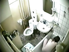 Hidden bath cam shoots nude girl taking the shower