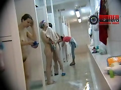 A group of hotties soaping up on a spy cam bath video