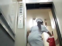Man ran out of the lift after having pulled the skirt up