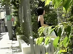 Foxy petite Japanese chick flashes her tits when sharking lad pulls down her top
