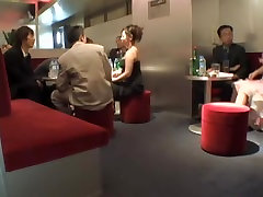 Hot Asian chicks provide upskirt shots in a crowded bar