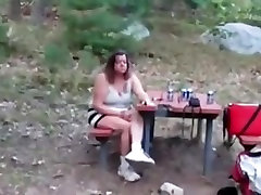 this babe is flashing her milk cans and pussey pee wet crack at the campground