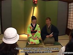 Asian babe in a kimono sucking on his erect prick