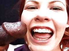 Black cock squirts its contents on redhead teen