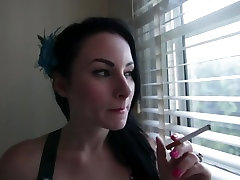 Brunette smoking blowjob and swallows cum