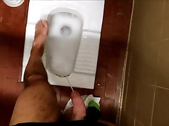 Pissing on my feet in a dutch fr geld toilet