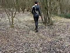Wetsuit fetish forest walking