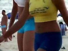 Girls playing volleyball in a tight bikini