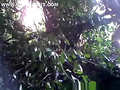 Woman 18 year old couple mutual beyond some bushes peeing