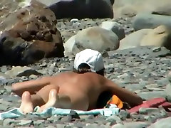 Couple trying to fuck on the beach