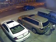 Security camera catches a sexx and shouting video bigboobs of desi behind a car