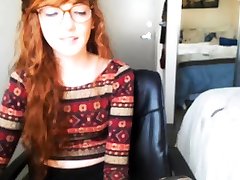 Redhead teen fingering her twat