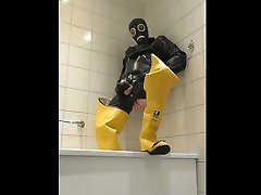 niello estpn and cum in rubber, waders and gasmask