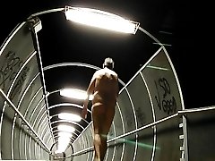 Walking naked on a bridge