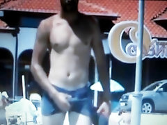 hot guy walking on free beaches rubbing his bulge