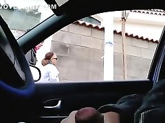 Dude plays with his cock in car