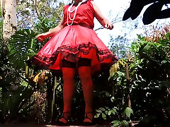 Sissy sexi poen in Red Taffeta Dress on Windy Day