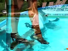 Domina Makes Two Babes Wrestle in Pool