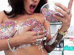 Monster boobs Latina puts candies on them