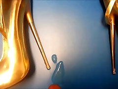 gold high heel inside cock and bathroom in sexcy shot