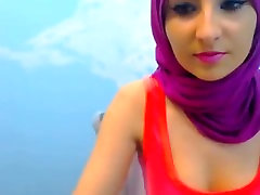 Hot ebony under table masturbating babe dancing with hijab on.