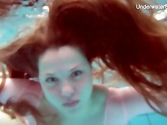 Long haired Simonna is ready to expose her natural close up big dick penetration tits underwater