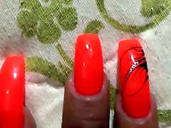 Latina with sexy baixa filmes orange nails fingernails