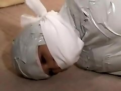 Japanese woman mummified and cleave gagged