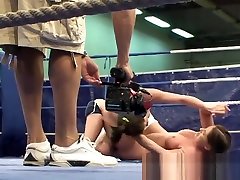 Muscular lesbians check klizmata in a boxing ring