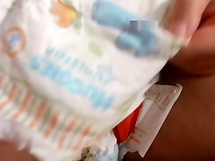 Diaper fetish pee session and whipping on pussy