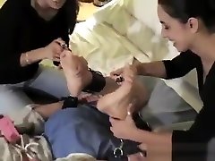 Hogtied and tickled by two women