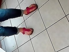 Sexy Feet in pink shoes of a MILF