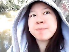 Asian voyeur wank on sunbathing teen gives a public blowjob