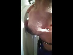licking the toilet clean