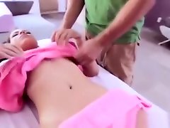 Naked brunette gets steamy massage