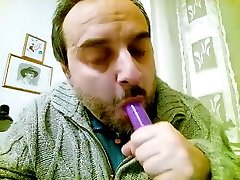 Sucking my purple dildo